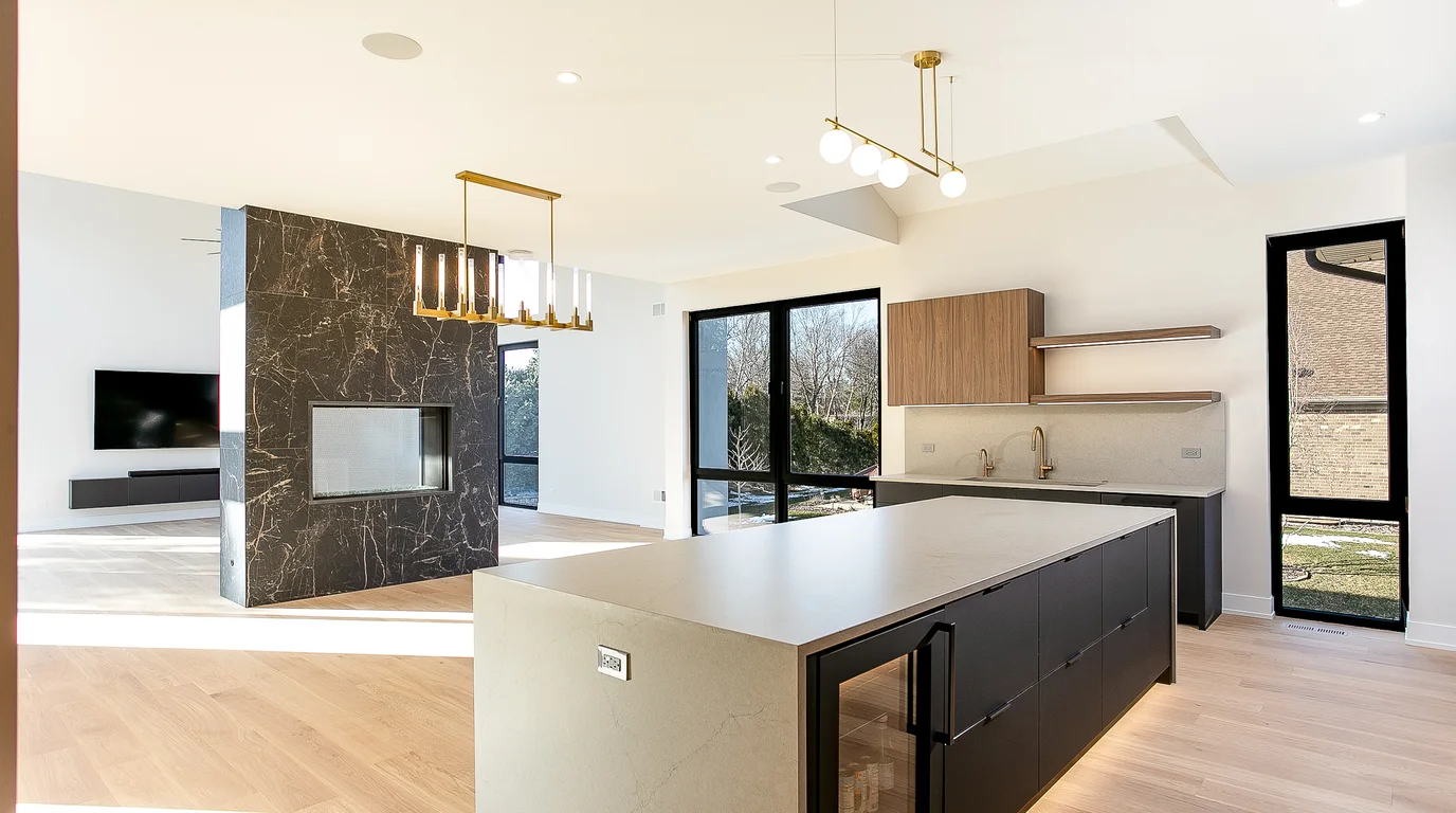 Luxury custom kitchen with marble island and brass detailing